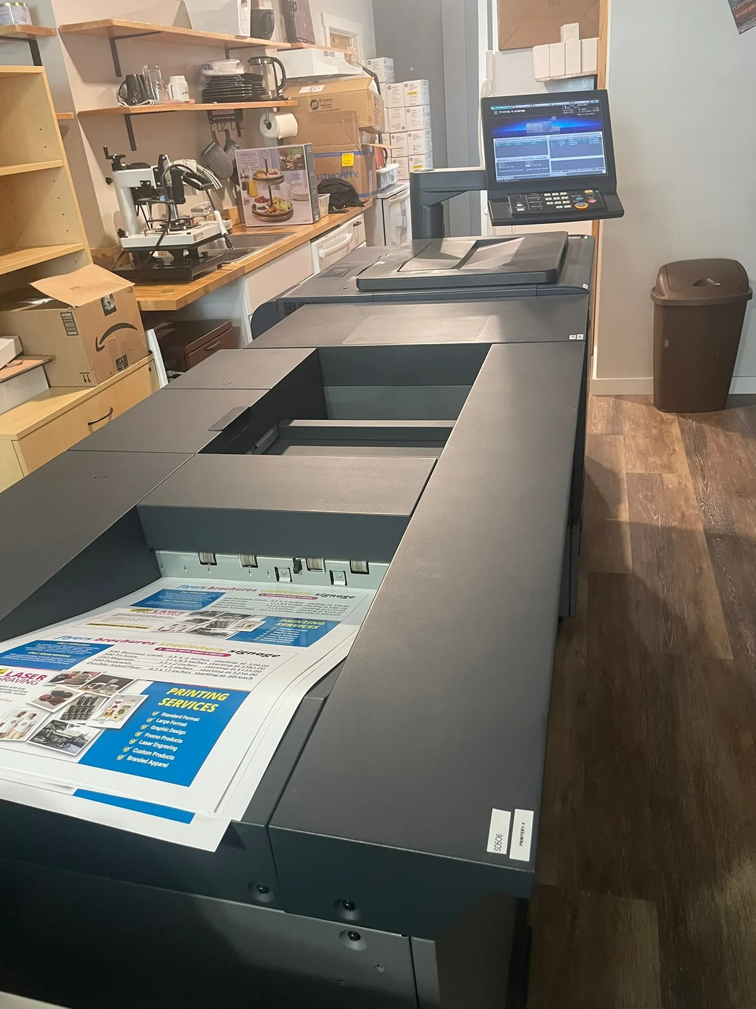 Production printer running a job inside the Gray Streak Creative shop in Ronan